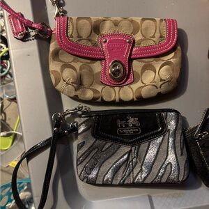 2- Coach Wristlets